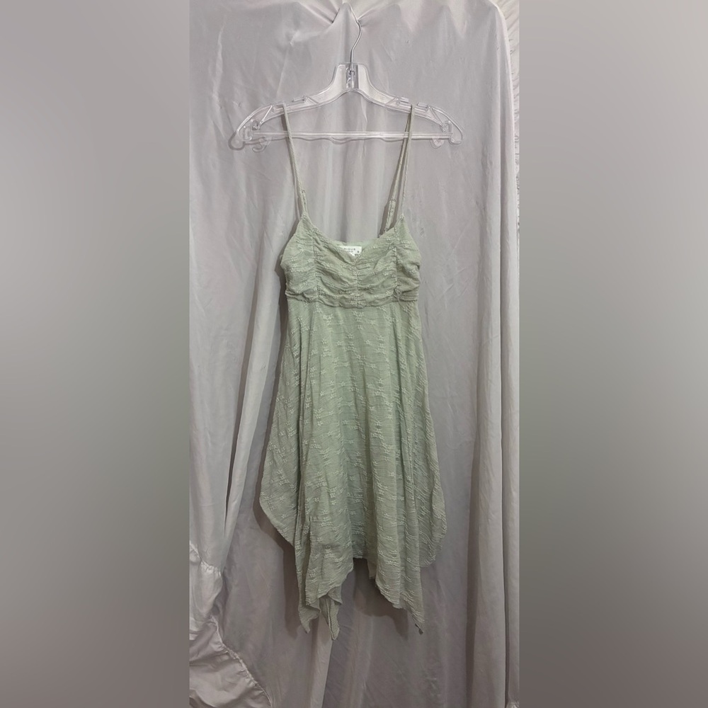 Kirious Los Angeles Smocked Bodice Handkerchief Hemline Babydoll Floral Dress